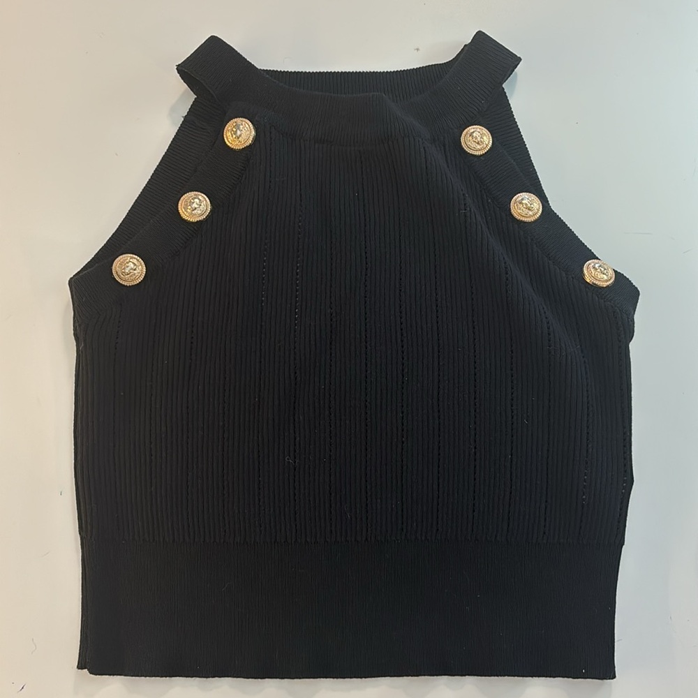 Black cropped, ribbed top with brass button accents